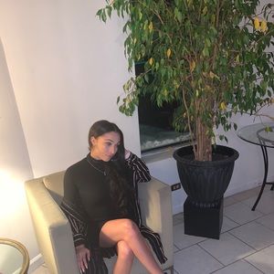 Cardigan, tan and black.